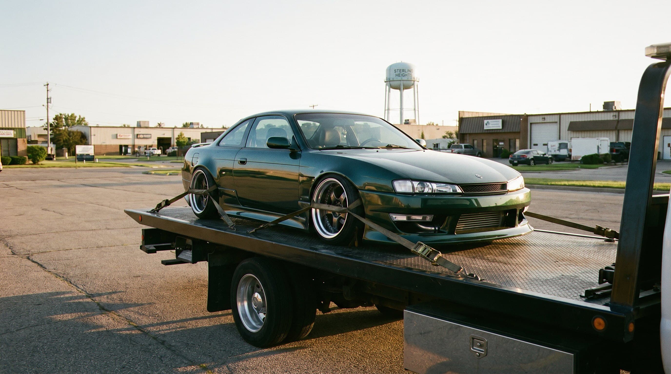Flatbed truck secured vehicle level